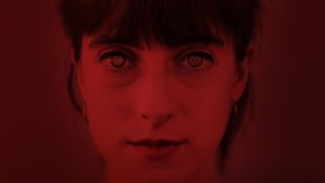 Portrait of woman through a red filter